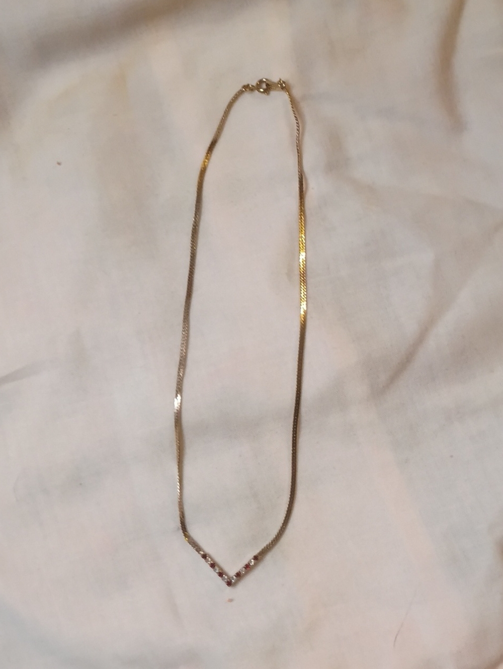 Vintage Avon Gold Tone V Necklace Garnets Rhinestone 6"